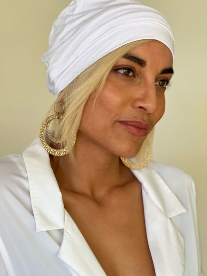 model wearing white bamboo beanie with blonde human hair hat wig